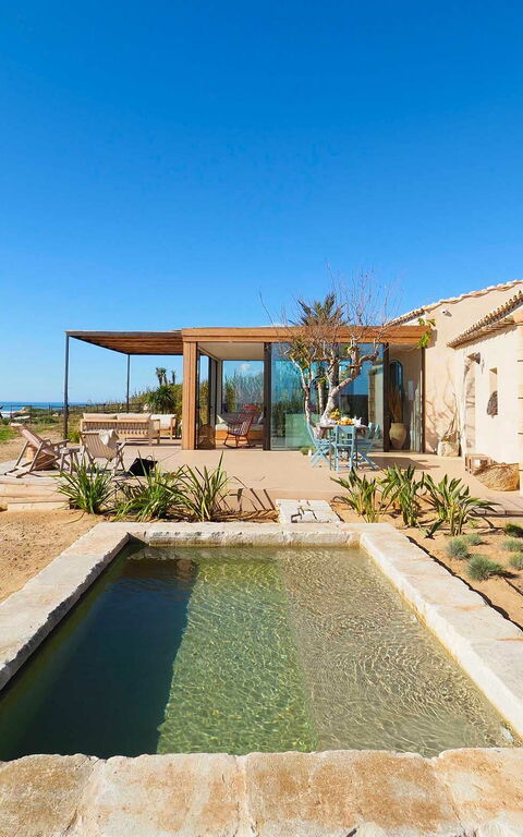 Circe: Building Exterior, Pool, Summer