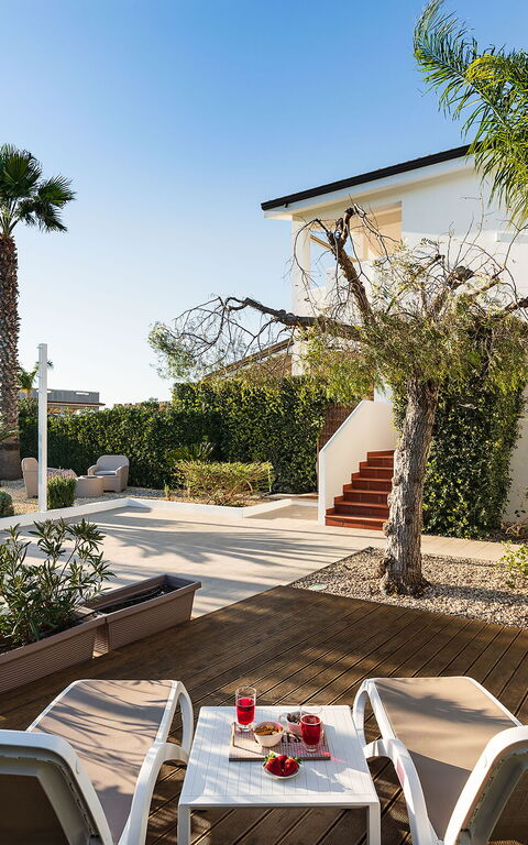 Anny: Building Exterior, Garden