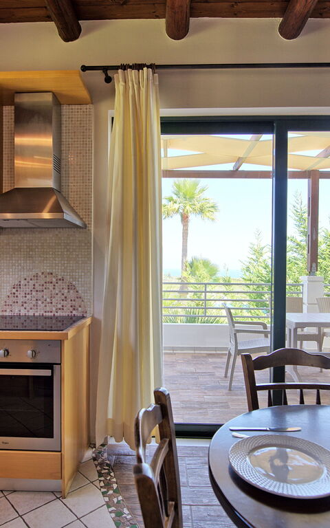 Villa Myrtia: Dining Room, Kitchen, Living Room