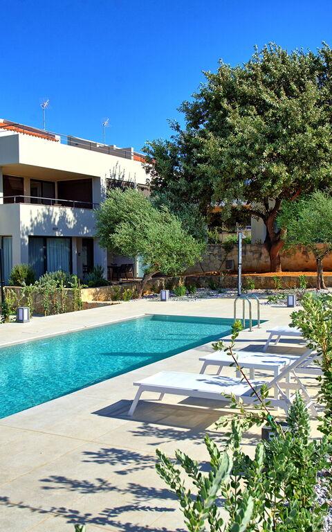 Iris: Building Exterior, Garden, Outdoor, Pool