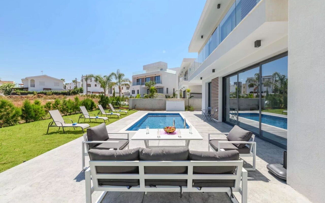 By the Beach - White Coral Villa: Building Exterior, Garden, Outdoor, Pool