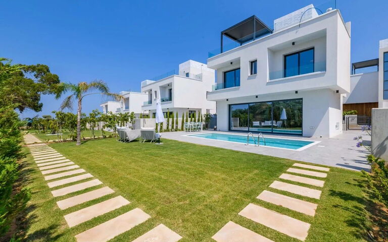 By the Beach - Blue Topaz Villa: Building Exterior, Garden, Outdoor, Pool