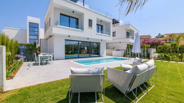 By the Beach - Blue Topaz Villa: Building Exterior, Garden, Outdoor, Pool